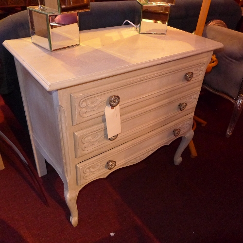 A French painted distressed finish three drawer chest with carved detail W 80 x D 43 x H 75 cm