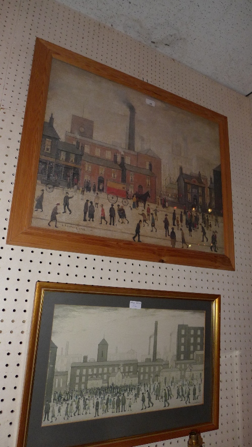 A framed and glazed Lowry style coloured print and a smaller similar [2] H 42 cm x 67 cm