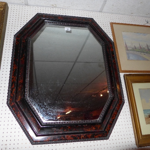 A French octagonal wall mirror within faux tortoiseshell frame W 72 x H 87 cm