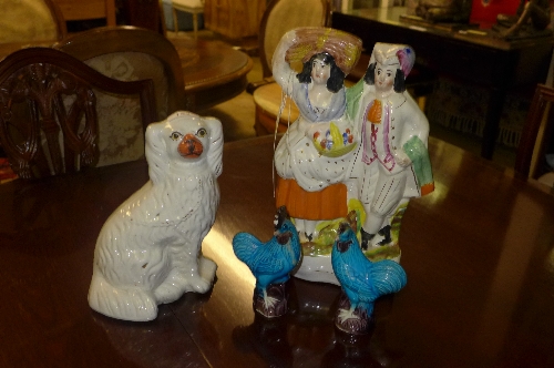 Two Staffordshire figures and two others