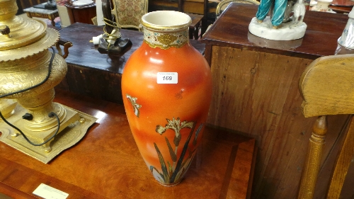 A pair of Satsuma vases with floral decoration on orange field