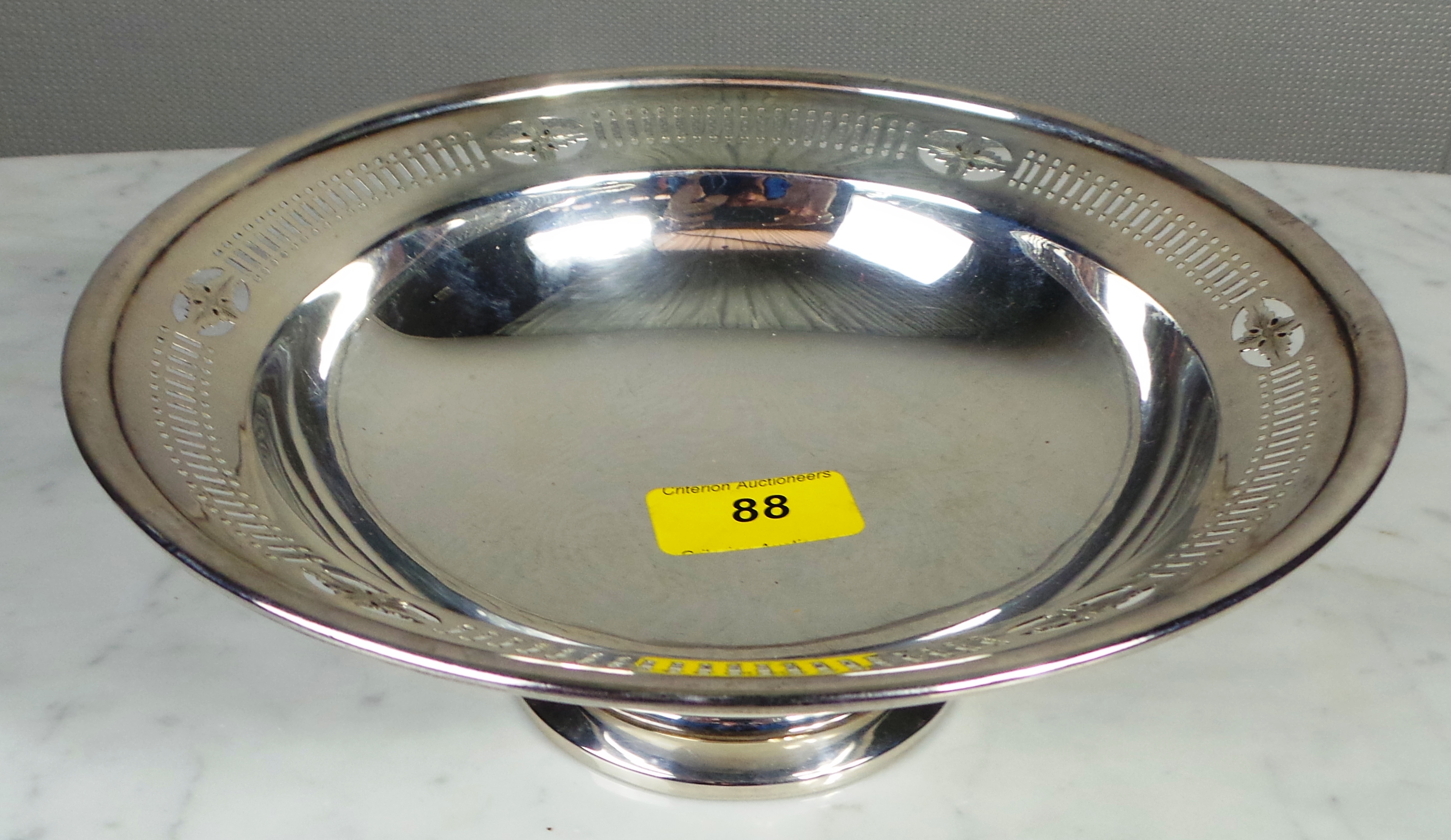 A silver Birmingham 1928 pedestal bowl with pierced border  21cm