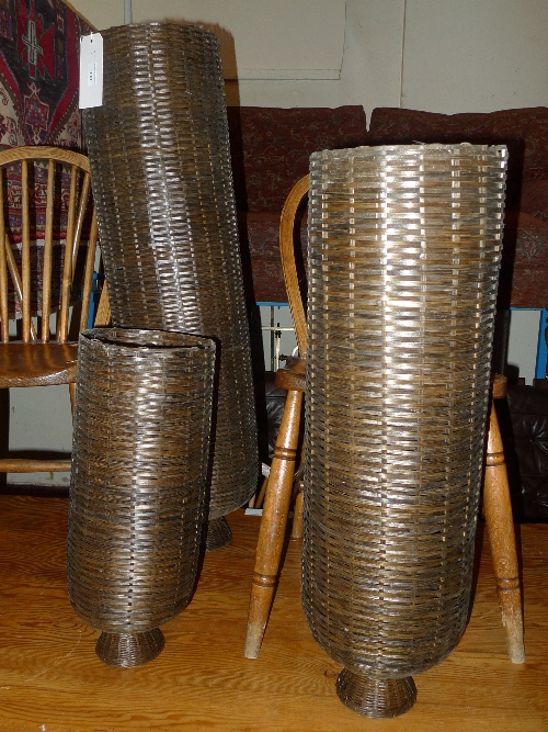 A set of three canework cylindrical form eel catchers H 50 - 105 cm