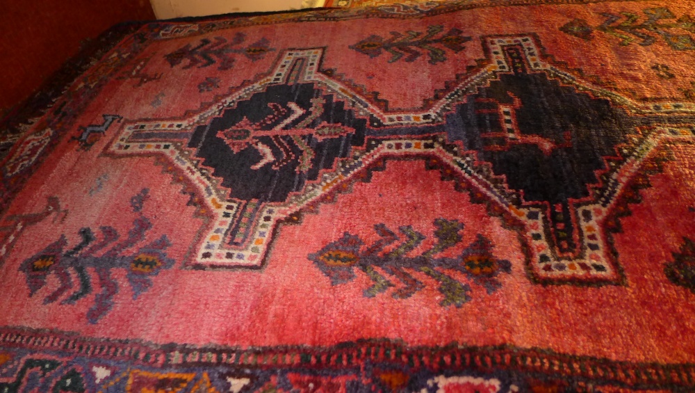 A fine South West Persian Qashgai runner 305 cm x 85 cm with repeating diamond shaped medallion on