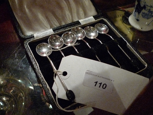 A set of six cased hallmarked silver coffee spoons