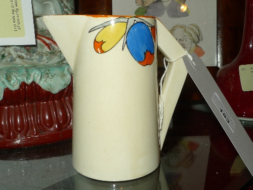 A Clarice Cliff jug Bizarre pattern Height 13 cm