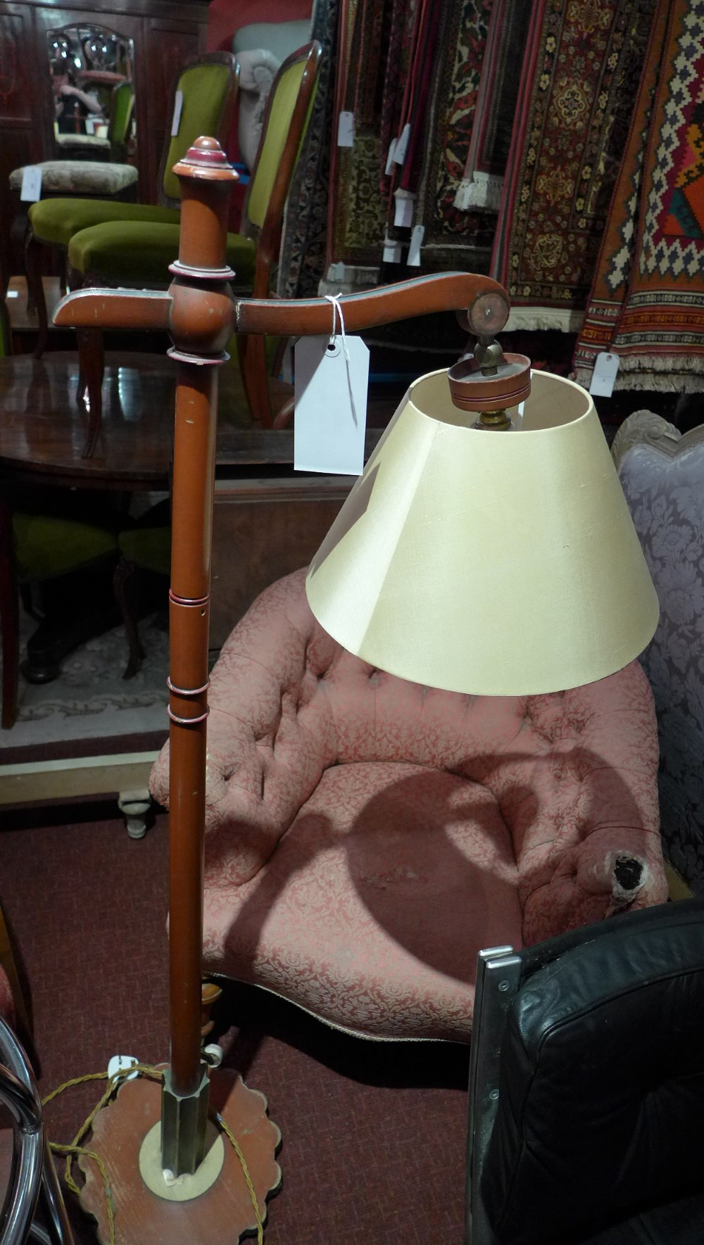 An Oriental red lacquered lamp standard with shade (A/F) H 145 cm