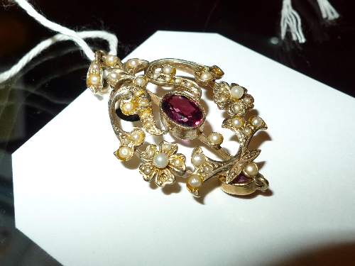 A 9 ct  gold garnet and seed pearl pendant