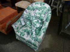 A Victorian mahogany tub chair with floral cover on castors W 64 D 69 H 82 cm