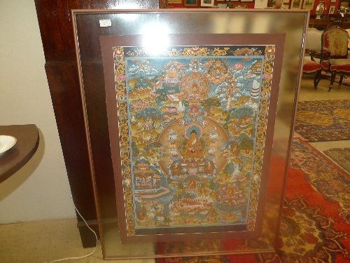 A Nepalese print of monks framed an glazed