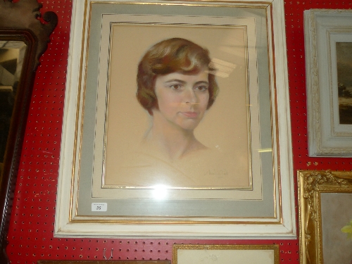 A framed and glazed portrait of a young lady signed Smith W 37 H 46 cm