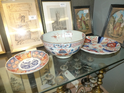 A collection of three Oriental Imari items including a C19th Japanese lotus dish with Buddhists