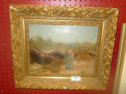 An oil on canvas tribal figures with camel within gilt frame W 25 H 19 cm