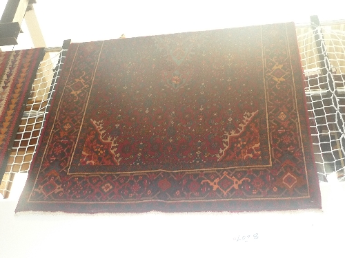 A fine North West Persian Bidjar rug central pendant medallion with repeating heratie motifs on a