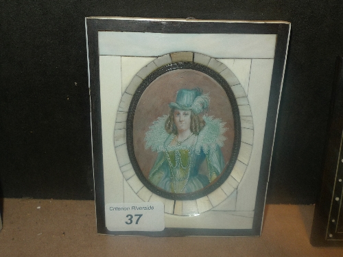 A miniature portrait of a lady in ivory frame W 11 H 14 cm