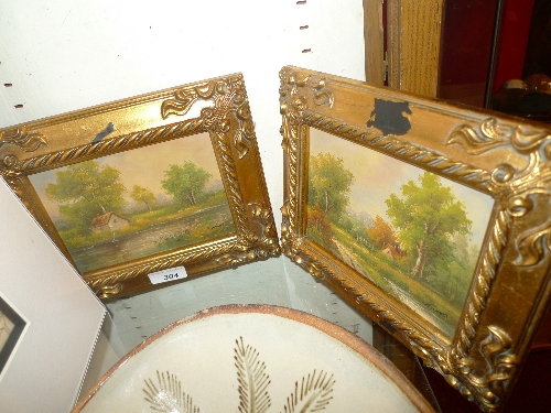 A pair of miniature paintings country cottage scenes