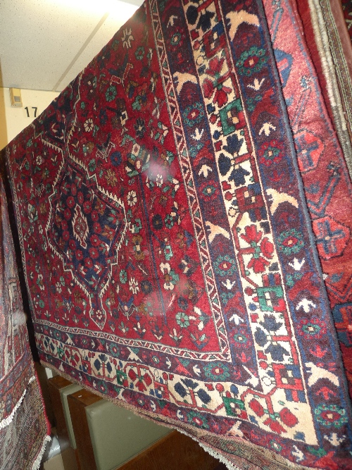 A fine North West Persian Afshan rug 227 cm x 172 cm with triple pole medallion surrounded by
