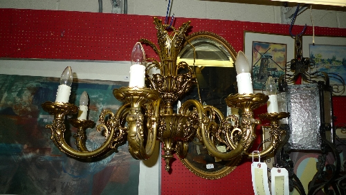 A gilt metal eight branch chandelier