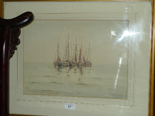 A framed and glazed watercolour of a seascape with sailing vessels