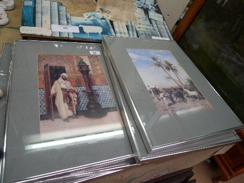 A set of photogravures of Islamic scenes within silver frames