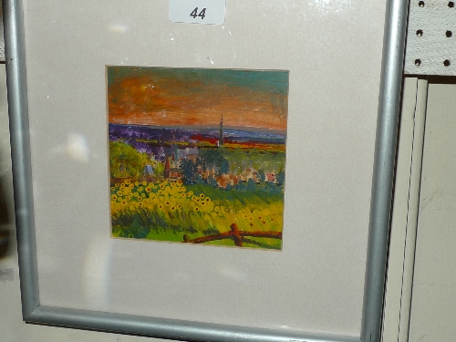 A watercolour field of brightly coloured flowers glazed and framed