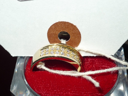 A 9ct gold ladies dress ring with inset diamond decoration