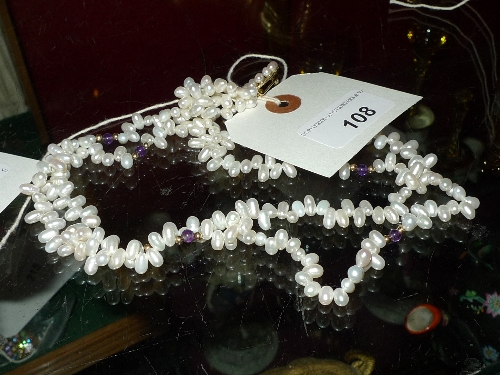 A ladies  Japanese pearl necklace and a similar brooch [2]