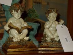 A pair of Victorian style putti bookends