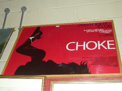 A framed poster advertising the film `Choke`