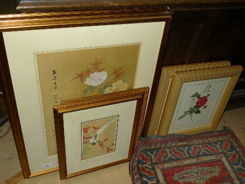 A pair of silken Chinese style panels of birds, two similar and others