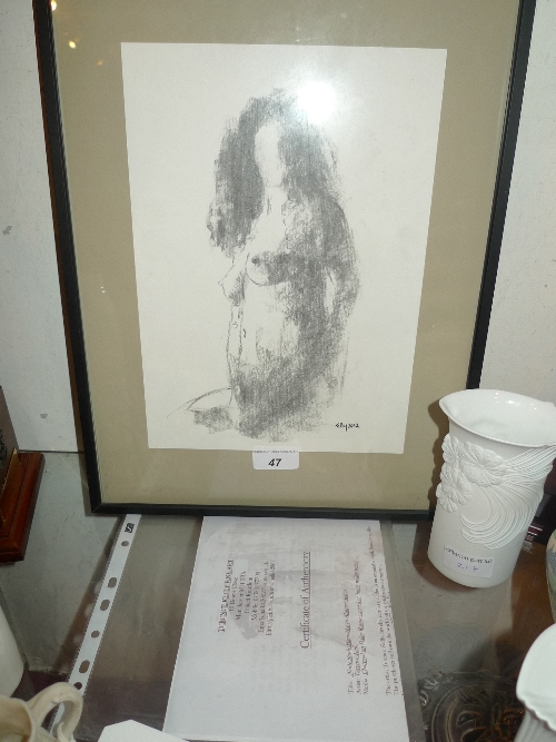 A charcoal drawing study of a nude lady in artists pose signed Terence Kelly