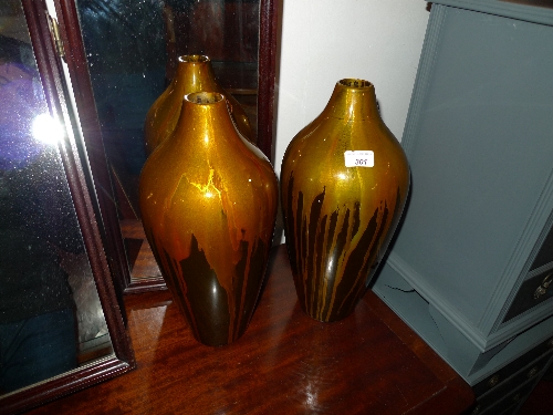 A pair of designer flamework flower vases of stylized form
