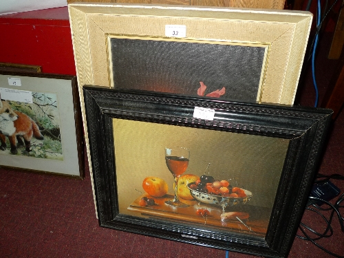 An oil canvas still life of a candle and flowers signed Rusche, together with an oleograph still