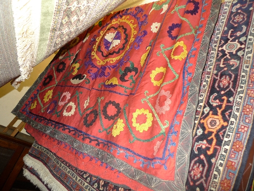 A fine Uzbekistan Suzanie wall hanging with repeat floral motifs 180 cm x 132 cm