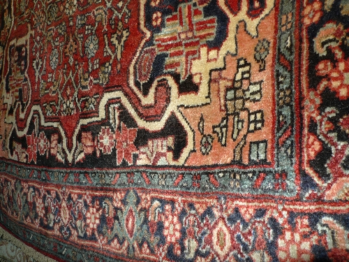 A fine North West Persian Bidjar rug with double pendant medallion and repeating Heratie motifs