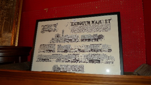 A framed and glazed print of Exmouth Market