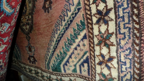 A fine old south west Persian Lori carpet.  265 cm x 160 cm, pendant medallion on a terracotta field