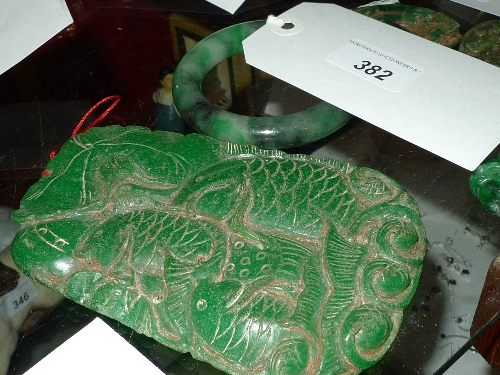 A Chinese jade style bangle together with five similar sculptures