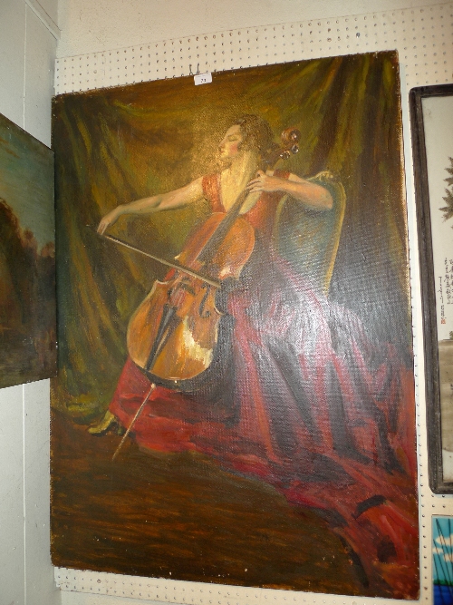 A C20th oil on board of a female cello player