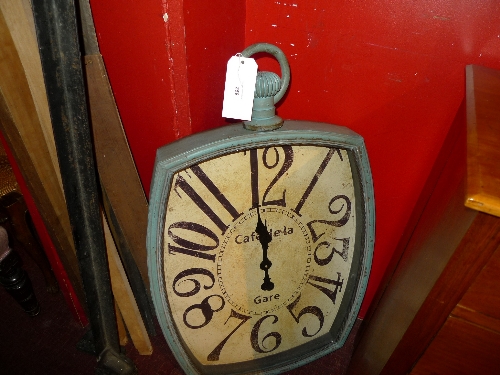 A Cafe de la Gare pocket watch form clock