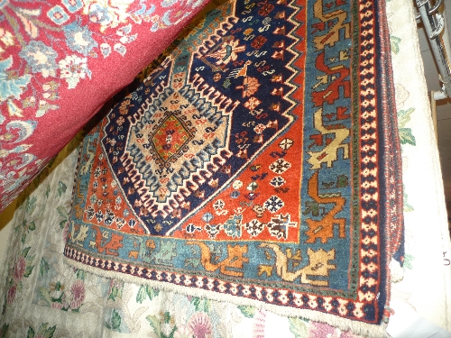 A fine North West Persian Yallemeh rug with triple pole medallion on a sapphire field within