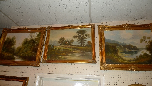 Three oils on canvas tree lined river and stream landscapes in gilt frames