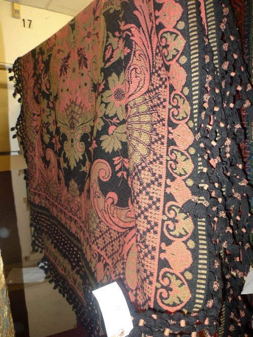 A Caso Pupa rug the red field decorated with birds in flight and foliate decoration