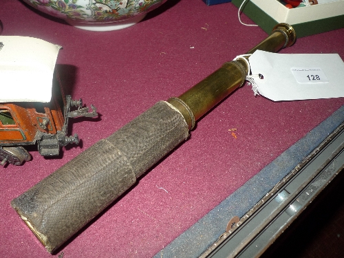 A brass and leather clad telescope