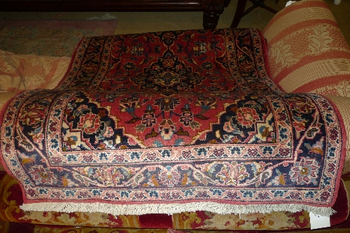 A fine north west Persian Tafresn rug 144cm x 108cm central pendent medallion on rouge field