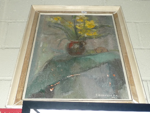 An Eastern European oil on canvas still life vase of daffodils signed and dated