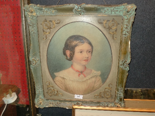 A watercolour portrait of a young girl within swept gilt frame