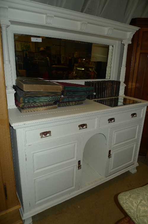 A Maple and Co white painted sideboard with bevelled mirror back above drawers and cupboard