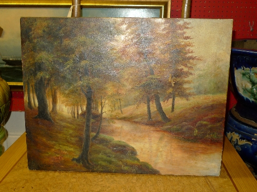 An oil on canvas tree lined stream signed A W Beal