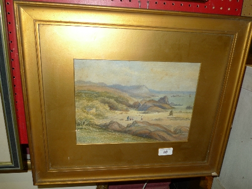 A watercolour coastal scene with figures signed